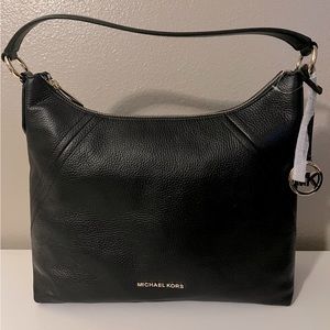 Michael Kors large leather shoulder bag.